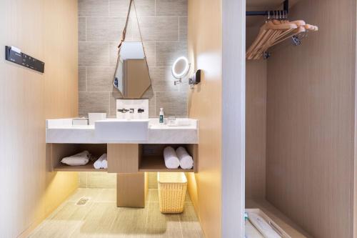 Imagen de la habitación del Hotel Atour Linyi Beijing Road. Foto 15