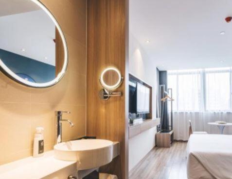 Imagen de la habitación del Hotel Atour Little Lujiazui Shanghai. Foto 4