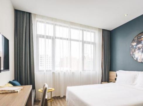 Imagen de la habitación del Hotel Atour Little Lujiazui Shanghai. Foto 6