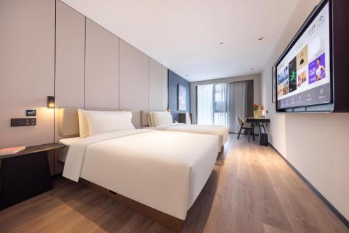Imagen de la habitación del Hotel Atour Nanjing Jinma Road Station. Foto 11