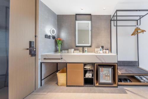 Imagen de la habitación del Hotel Atour Nanjing Jinma Road Station. Foto 12