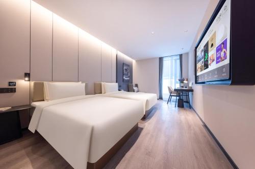 Imagen de la habitación del Hotel Atour Nanjing Jinma Road Station. Foto 15