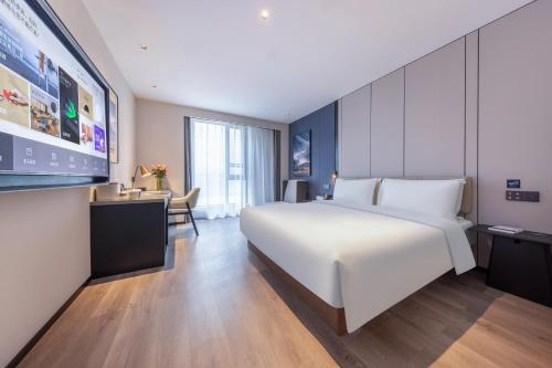 Imagen de la habitación del Hotel Atour Nanjing Jinma Road Station. Foto 16