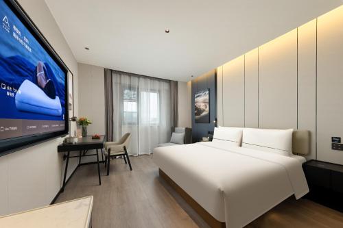 Imagen de la habitación del Hotel Atour Nantong Haimen Wenfeng Dashijie. Foto 12