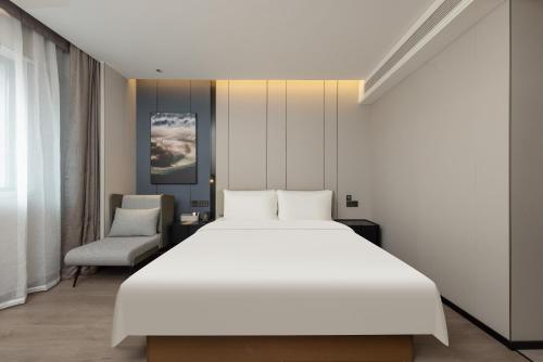 Imagen de la habitación del Hotel Atour Nantong Haimen Wenfeng Dashijie. Foto 13