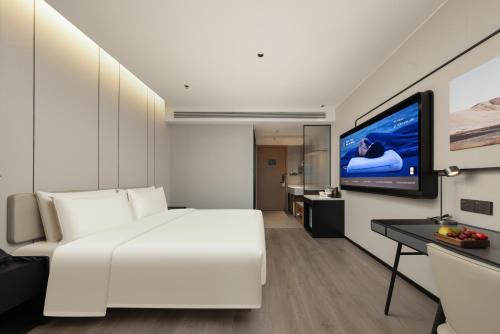 Imagen de la habitación del Hotel Atour Nantong Haimen Wenfeng Dashijie. Foto 14