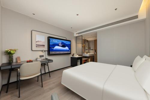 Imagen de la habitación del Hotel Atour Nantong Haimen Wenfeng Dashijie. Foto 15
