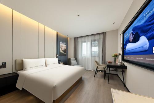 Imagen de la habitación del Hotel Atour Nantong Haimen Wenfeng Dashijie. Foto 16