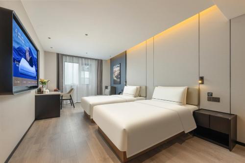 Imagen de la habitación del Hotel Atour Nantong Haimen Wenfeng Dashijie. Foto 20