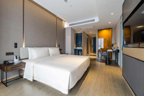 Imagen de la habitación del Hotel Atour Ningbo Bund Road Jinxintiandi. Foto 4