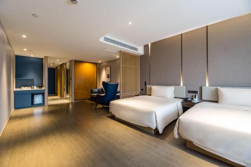 Imagen de la habitación del Hotel Atour Ningbo Bund Road Jinxintiandi. Foto 6