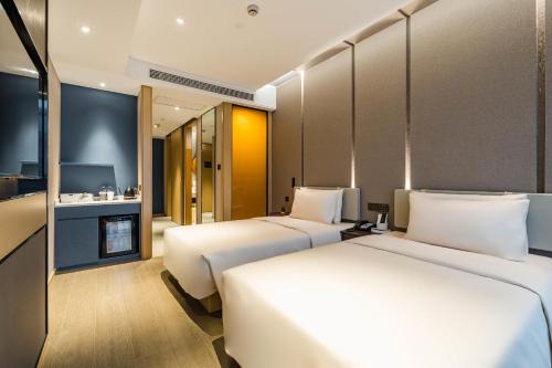 Imagen de la habitación del Hotel Atour Ningbo Bund Road Jinxintiandi. Foto 7