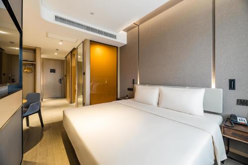 Imagen de la habitación del Hotel Atour Ningbo Bund Road Jinxintiandi. Foto 8