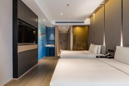 Imagen de la habitación del Hotel Atour Ningbo Bund Road Jinxintiandi. Foto 9