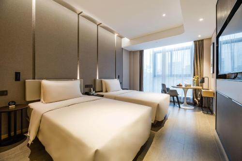 Imagen de la habitación del Hotel Atour Ningbo Bund Road Jinxintiandi. Foto 10