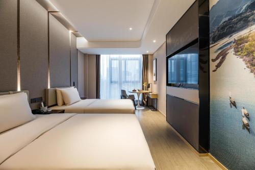 Imagen de la habitación del Hotel Atour Ningbo Bund Road Jinxintiandi. Foto 13