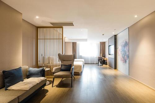 Imagen de la habitación del Hotel Atour Ningbo Bund Road Jinxintiandi. Foto 14