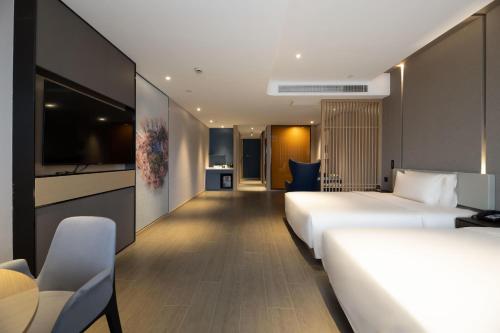 Imagen de la habitación del Hotel Atour Ningbo Bund Road Jinxintiandi. Foto 15