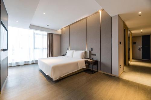 Imagen de la habitación del Hotel Atour Ningbo Bund Road Jinxintiandi. Foto 16