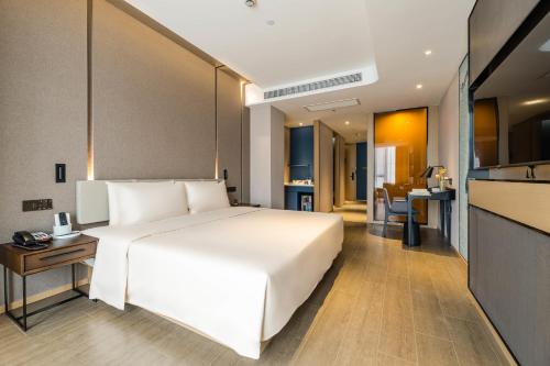 Imagen de la habitación del Hotel Atour Ningbo Bund Road Jinxintiandi. Foto 17