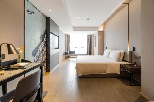 Imagen de la habitación del Hotel Atour Ningbo Bund Road Jinxintiandi. Foto 19