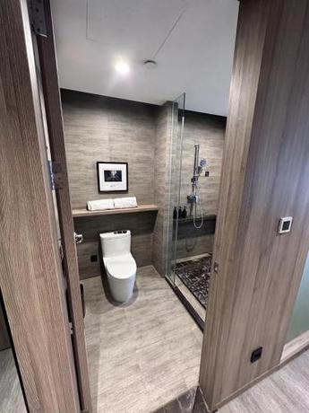 Imagen de la habitación del Hotel Atour Ningbo Laowaitan. Foto 17
