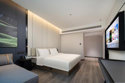 Imagen de la habitación del Hotel Atour Ningbo Ninghai. Foto 8