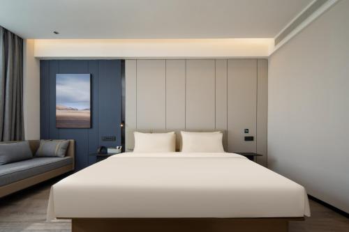 Imagen de la habitación del Hotel Atour Ningbo Ninghai. Foto 10