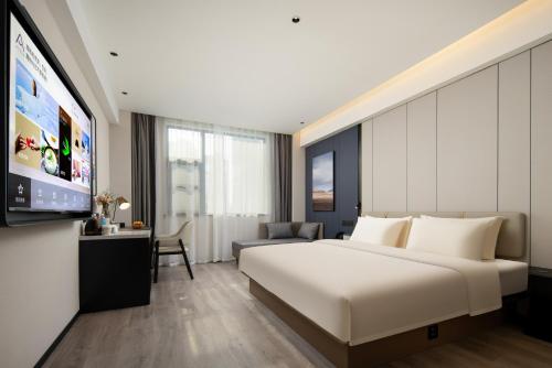 Imagen de la habitación del Hotel Atour Ningbo Ninghai. Foto 12