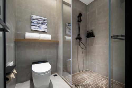 Imagen de la habitación del Hotel Atour Ningbo Ninghai. Foto 13