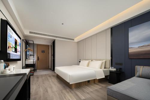 Imagen de la habitación del Hotel Atour Ningbo Ninghai. Foto 14
