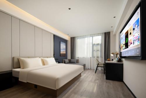 Imagen de la habitación del Hotel Atour Ningbo Ninghai. Foto 15