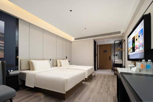 Imagen de la habitación del Hotel Atour Ningbo Ninghai. Foto 17