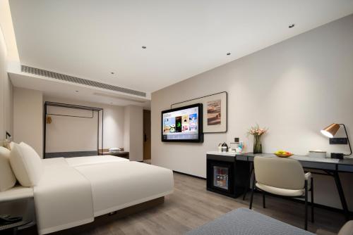 Imagen de la habitación del Hotel Atour Ningbo Ninghai. Foto 18