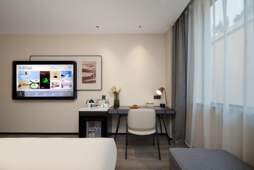 Imagen de la habitación del Hotel Atour Ningbo Ninghai. Foto 19