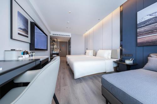 Imagen de la habitación del Hotel Atour Qingdao Laoshan Shilaoren Beach. Foto 15