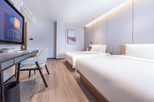 Imagen de la habitación del Hotel Atour Qingdao Laoshan Shilaoren Beach. Foto 19