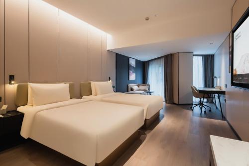 Imagen de la habitación del Hotel Atour Qingdao May 4th Square Municipal Government. Foto 5
