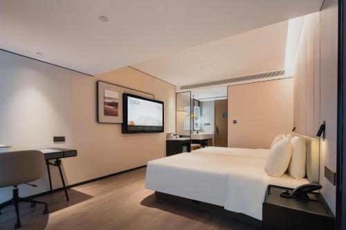 Imagen de la habitación del Hotel Atour Qingdao May 4th Square Municipal Government. Foto 6