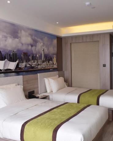 Imagen de la habitación del Hotel Atour Qingdao Olympic Sailing Center May Fourth Square. Foto 9