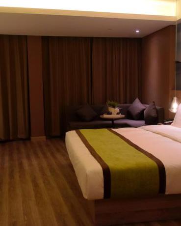 Imagen de la habitación del Hotel Atour Qingdao Olympic Sailing Center May Fourth Square. Foto 13