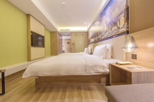Imagen de la habitación del Hotel Atour Qingdao Olympic Sailing Center May Fourth Square. Foto 16