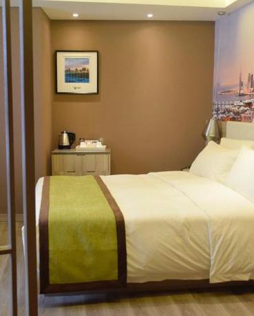 Imagen de la habitación del Hotel Atour Qingdao Olympic Sailing Center May Fourth Square. Foto 18