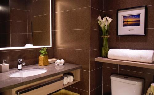 Imagen de la habitación del Hotel Atour Qingdao Olympic Sailing Center May Fourth Square. Foto 19