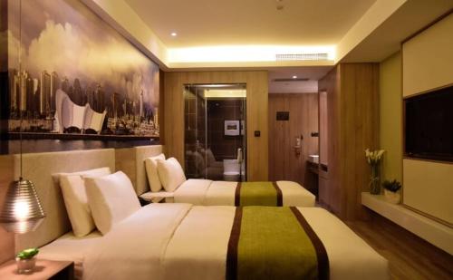Imagen de la habitación del Hotel Atour Qingdao Olympic Sailing Center May Fourth Square. Foto 20