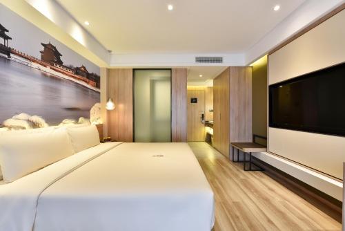 Imagen de la habitación del Hotel Atour Qinhuangdao Nandaihe Xianluo Island. Foto 4