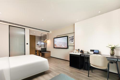 Imagen de la habitación del Hotel Atour Quanzhou Jinjiang Sunshine Plaza. Foto 9