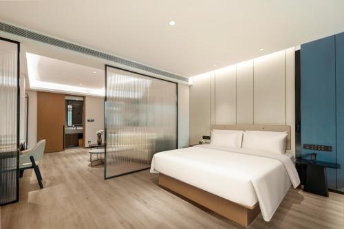 Imagen de la habitación del Hotel Atour Quanzhou Jinjiang Sunshine Plaza. Foto 11