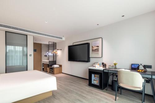 Imagen de la habitación del Hotel Atour Quanzhou Jinjiang Sunshine Plaza. Foto 13