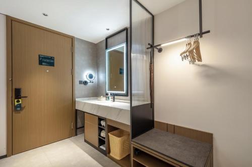 Imagen de la habitación del Hotel Atour Quanzhou Jinjiang Sunshine Plaza. Foto 14